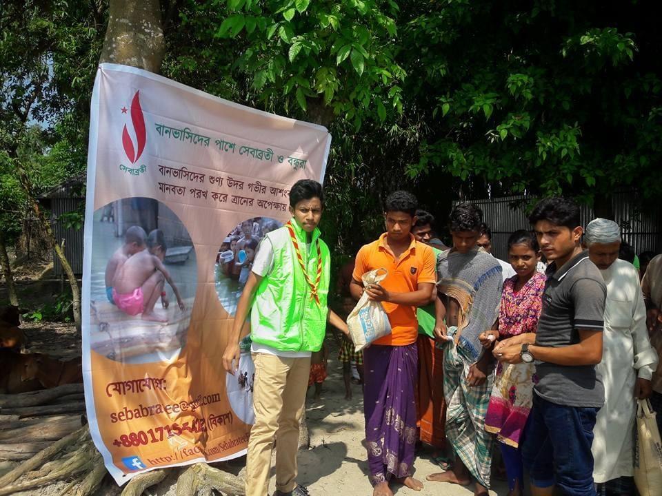 Relief distribution to flood affected peoples by Sebabratee Mukta Scout Group 