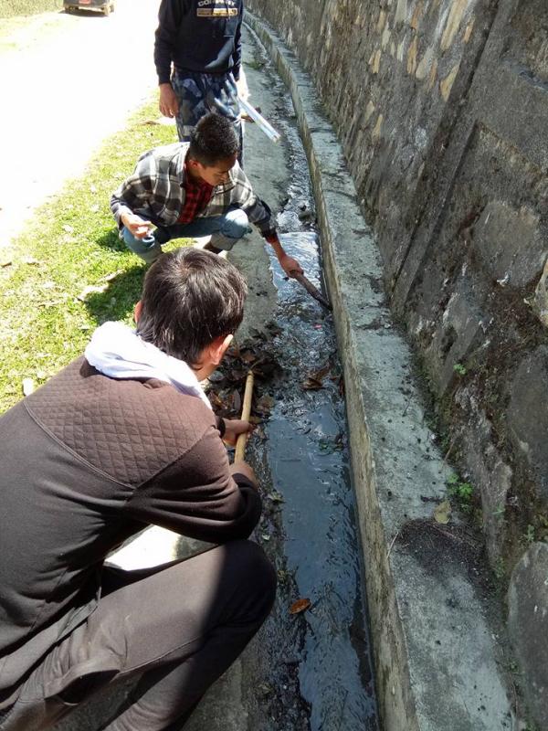 cleaning a road side