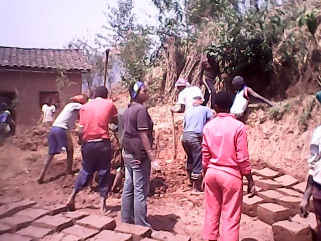 building the medium house of poor woman