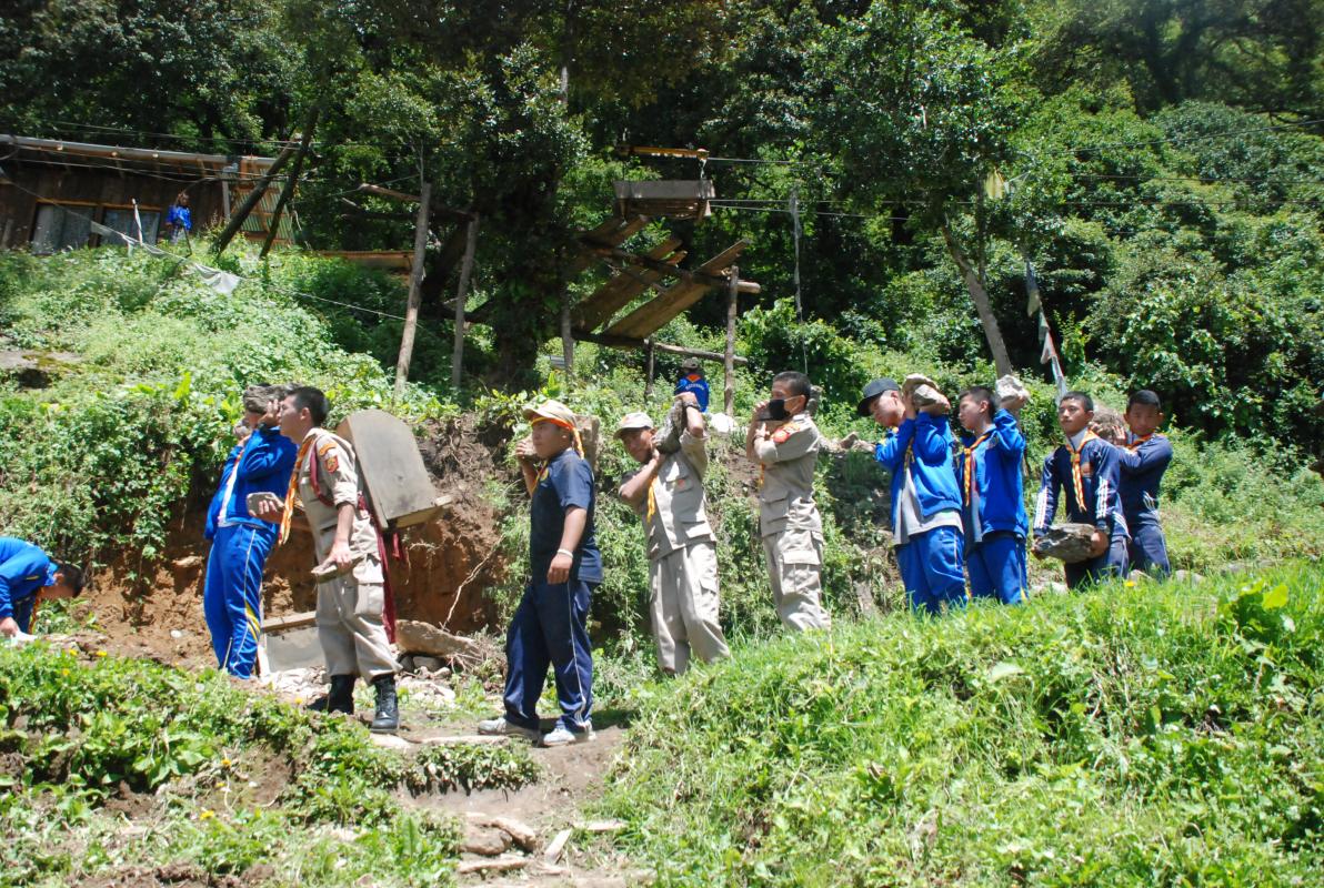 Bhutan Scouts: No job too big or small, Community service helps all.