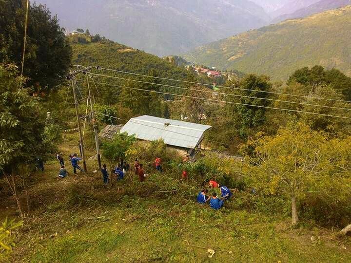 Cleaning around the lhakhang