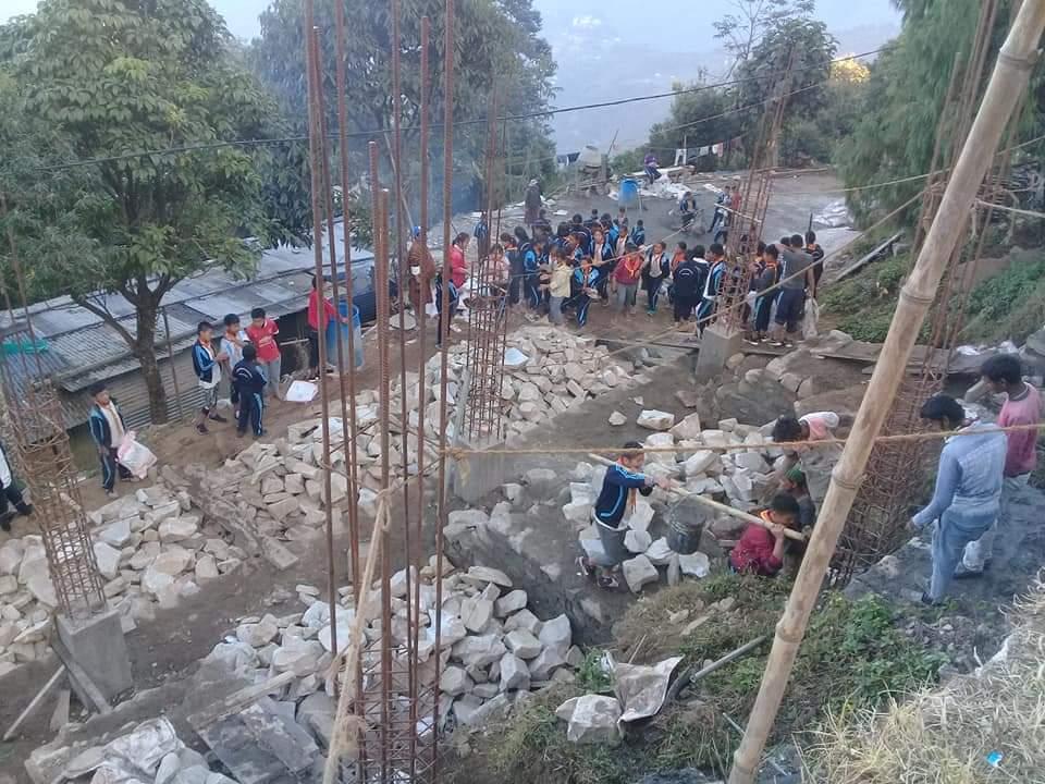 Voluenteering for construction site for Temple