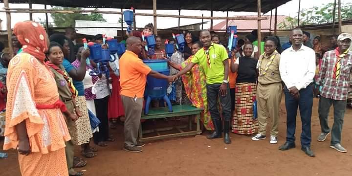 Uganda Scouts donate water filters to communities to improve water safety.