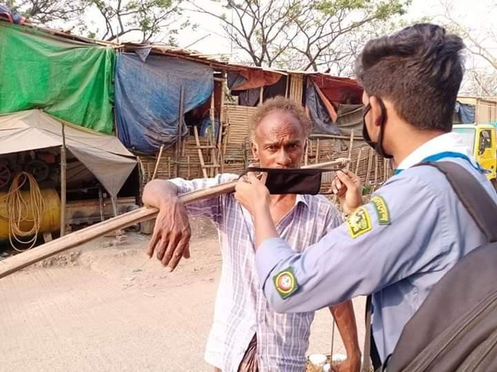 কোরোনা ভাইরাসের জন্য সচেতনতা ও মাক্স বিতরণ 