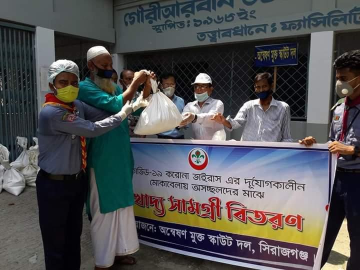 দূর্যোগ মোকাবেলায় অসহায়দের মাঝে খাদ্য সামগ্রী বিতরণ।