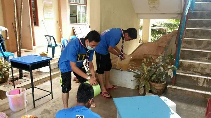 cleaning school after flood