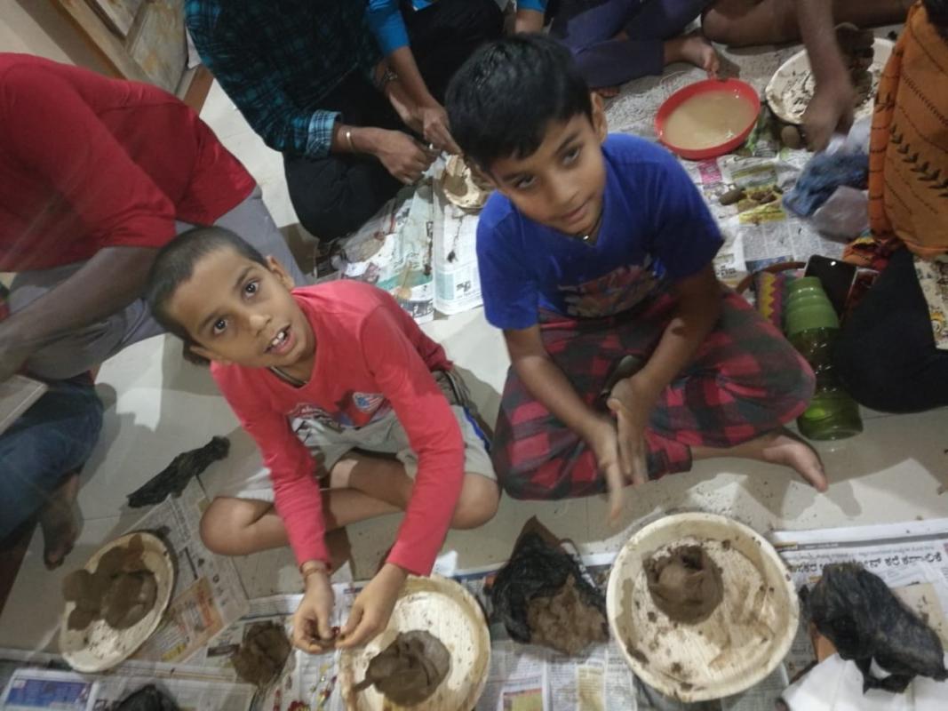 Making of clay ganeshas