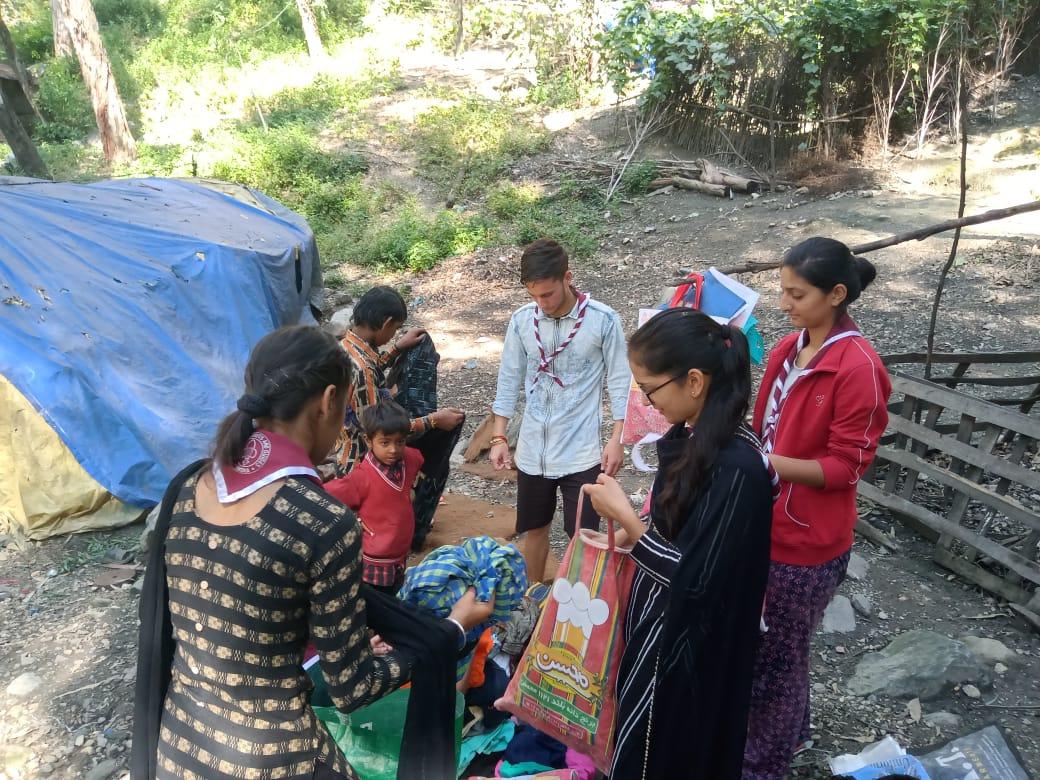 Provide clothes to needy people in slum