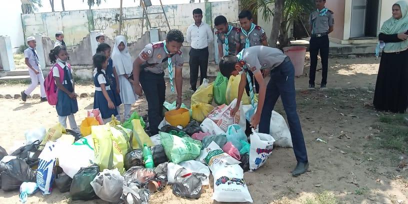 Dengue awareness and collecting garbage from student's environment