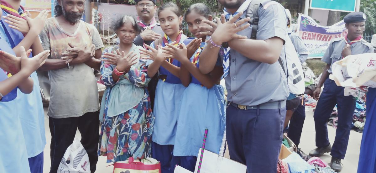  Distribution of clothes and food to needy people. 