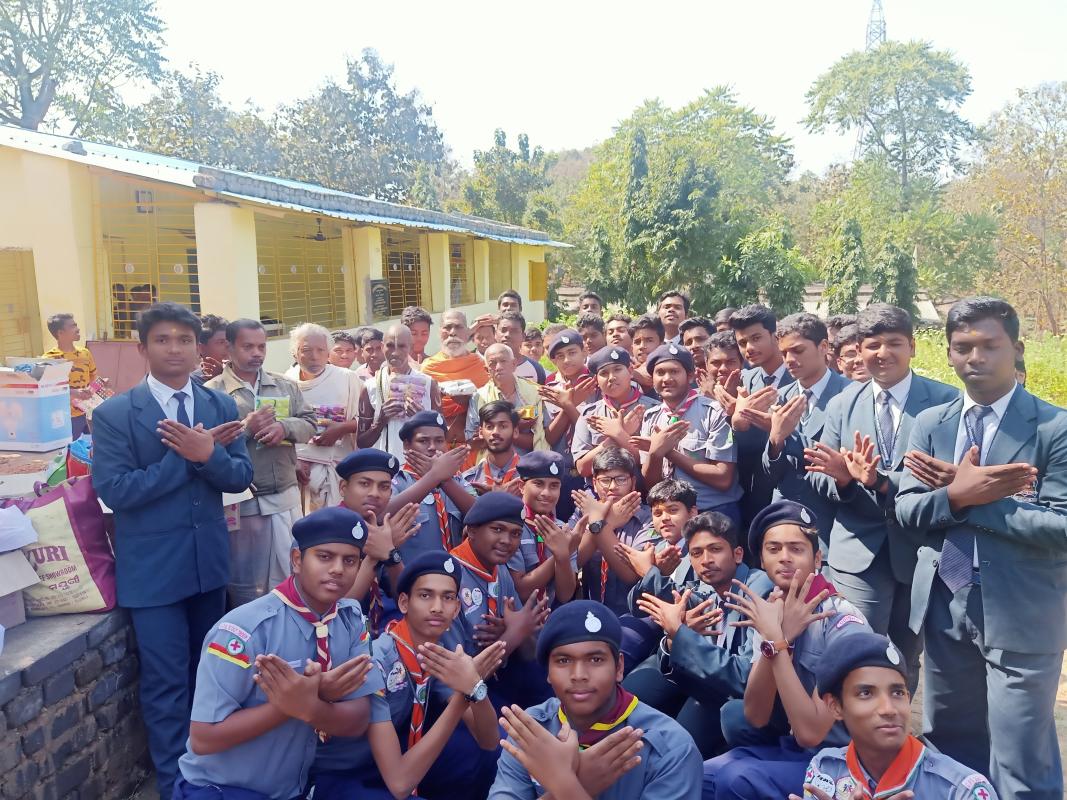 Distribution of food and clothes an orphanage 