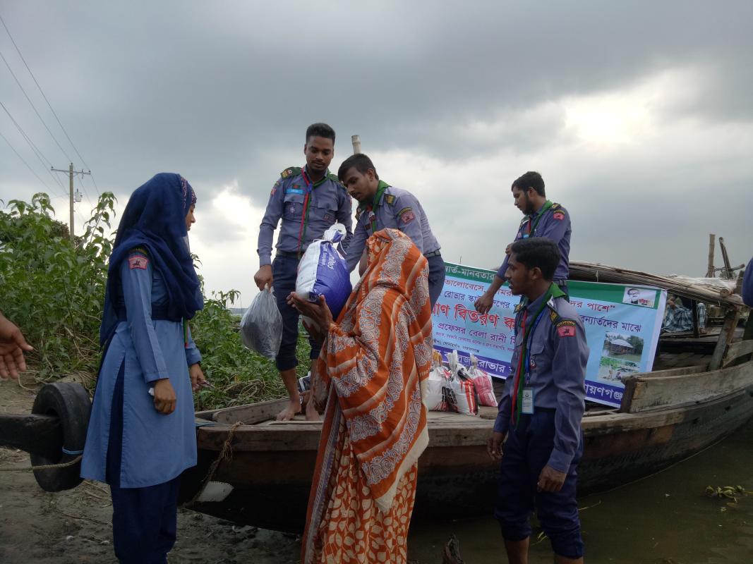 Distribute relief supplies to flood victims.