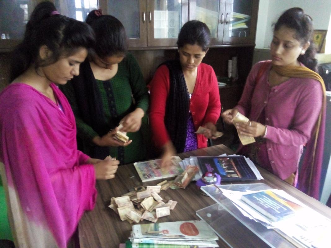 Project- "SAMARTH"- Part-IX, Counting donation/ checking the clothes collected by Rover Ranger unit ( Celebrating International Peace Month-Sept 2015)