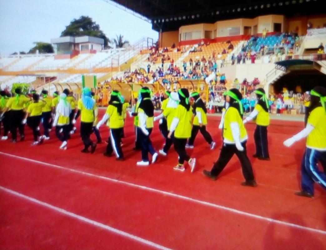 Bertugas pada hari sukan.
