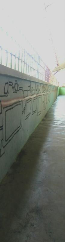 Mural abad ke 21 di sepanjang koridor.