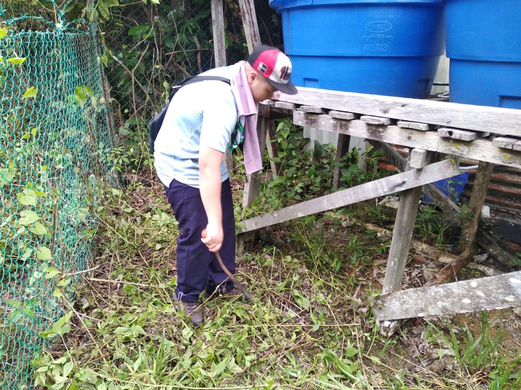 Environmental cleaning in progress at the begining tip of the legendary Borneo Island where Malaysia's lighthouse is situated next to Indonesia's. 