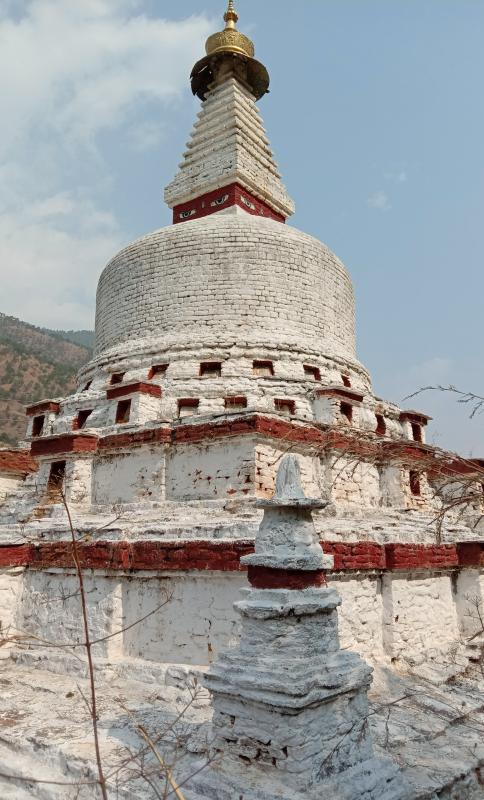 White washing of Chorten (Stupa) 