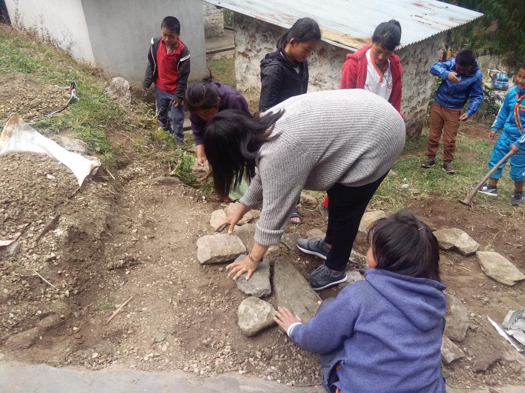 Making steps leading to toilet for special need students.