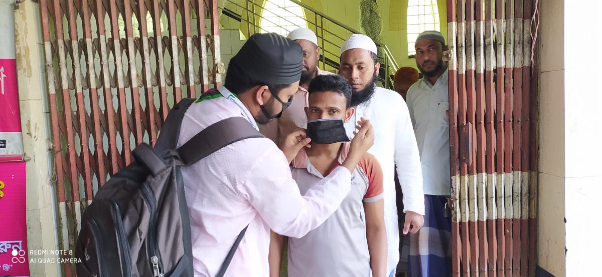 করোনা ভাইরাস এর সময় মাস্ক বিতরণ কর্মসূচি 