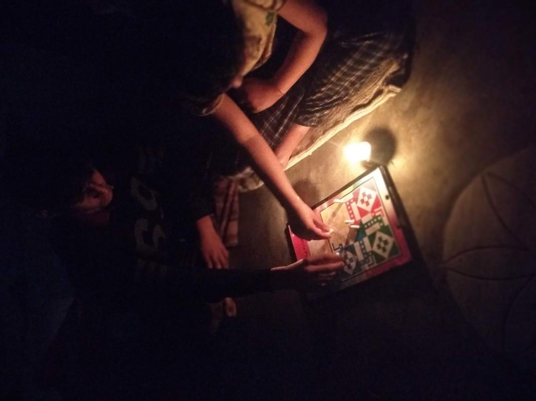 Tonight we played ludo game with our family... we did much entertainment by playing that ludo game.... 
#