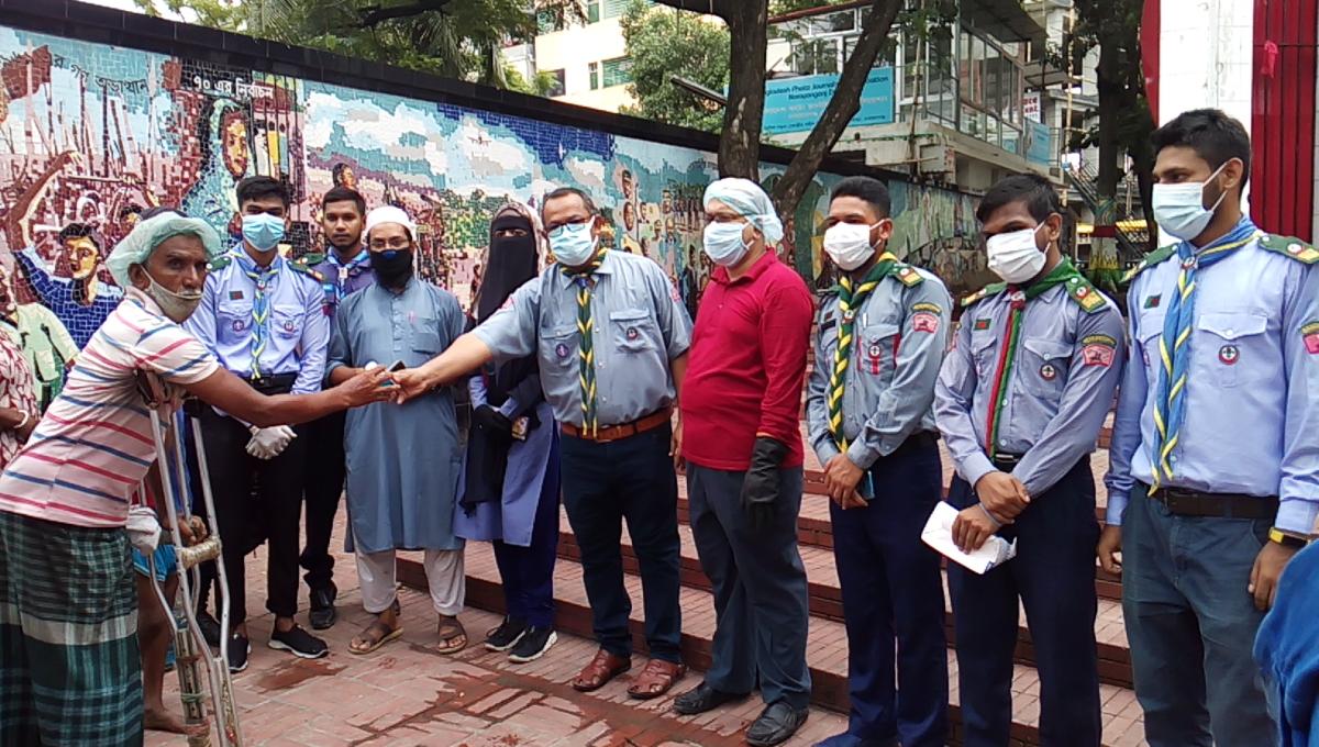 Distributing Mask, Soap & Hand Sanitizer to the Poor People.