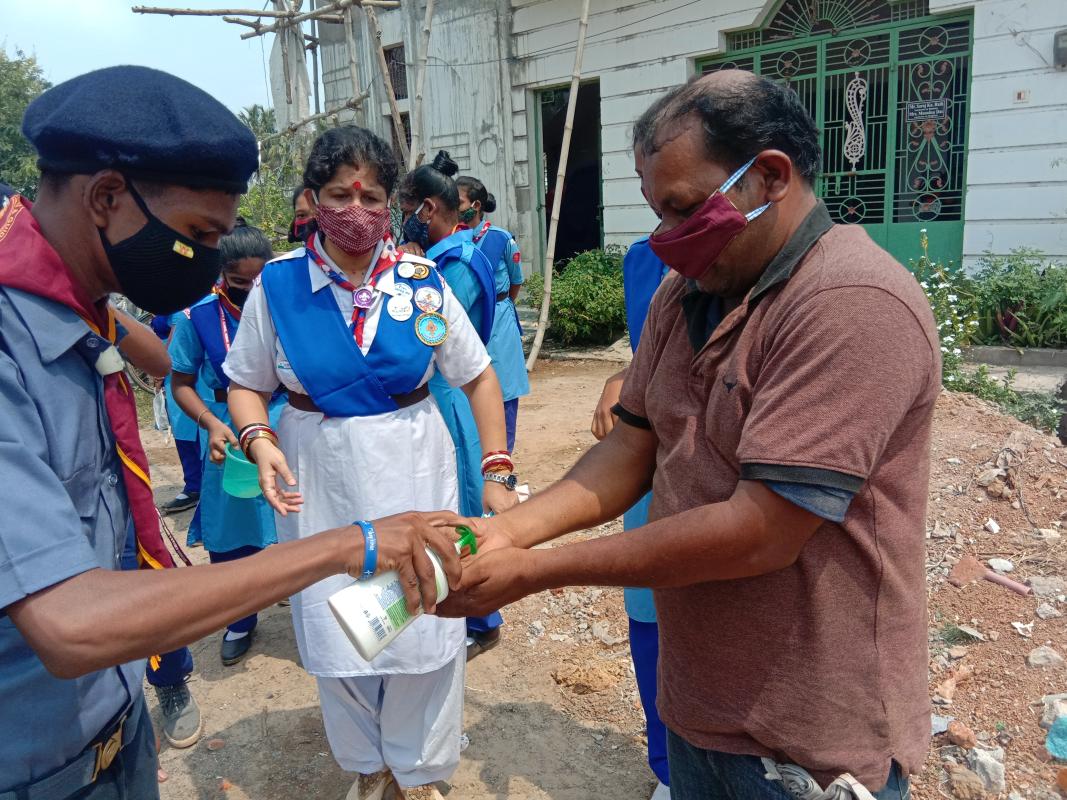 handwash and mask distribution by rovers nd rangers, s. b. sc. h. s. School konisi Ganjam odisha. project continuing since a year since the pandemic covid19 has started