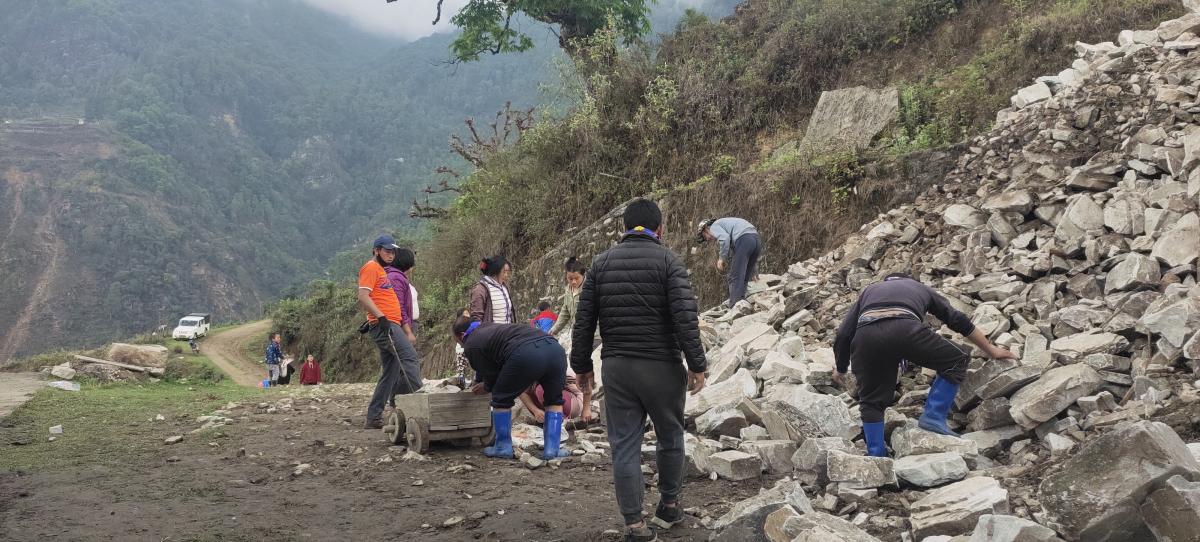 Maintaining of farm road toward temple