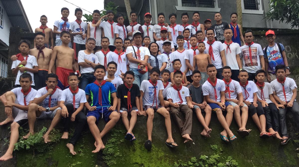 Cleaning the flowing public spring pool with the MNHS Senior Scouts