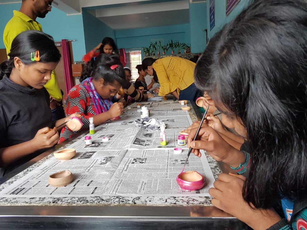 Diwali Celebration in a Local Orphanage with donation of sweets and clothes.