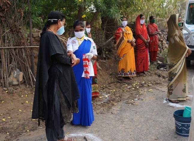 Hand wash demonstration and soaps, sanitizers distribution at Panderpali village