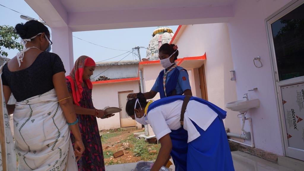 Distribution of cooked food at Bargaon hospital.