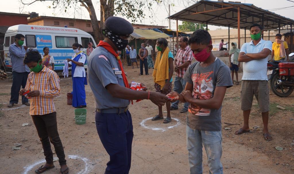 Hand wash demonstration and soaps, sanitizers distribution at Jarangloi Basti of Bargaon Block