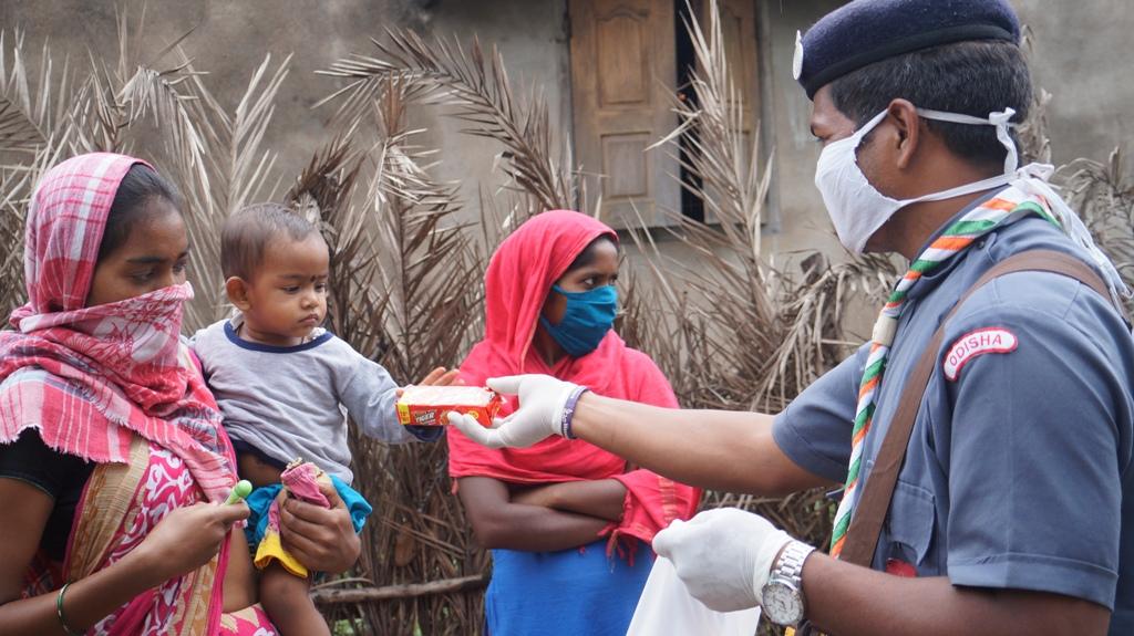 Snacks, biscuits distribution at Padajampali village of Rajgangpur Block