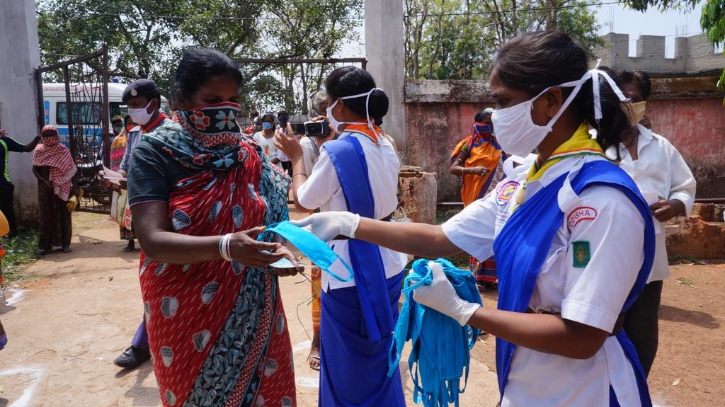 Mask distribution at Hemgir village