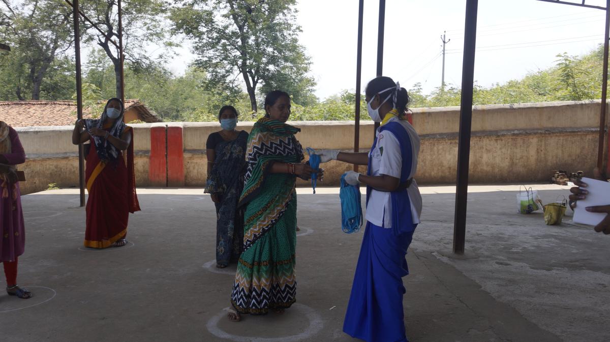 Mask distribution at Tangarpali village
