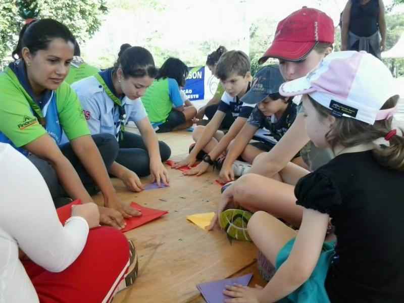 Teaching Kids Origami in AVISTAR KIDS in Campo Grande, MS, Brazil