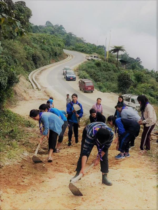 Maintenance of unpaved road for a religious event 