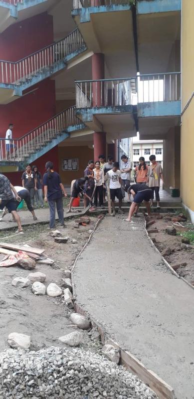 Construction of footpath between RK Hostel and College Infirmary 