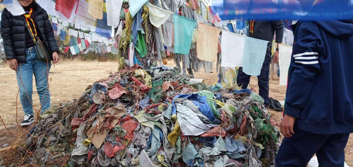 collecting old prayer flags
