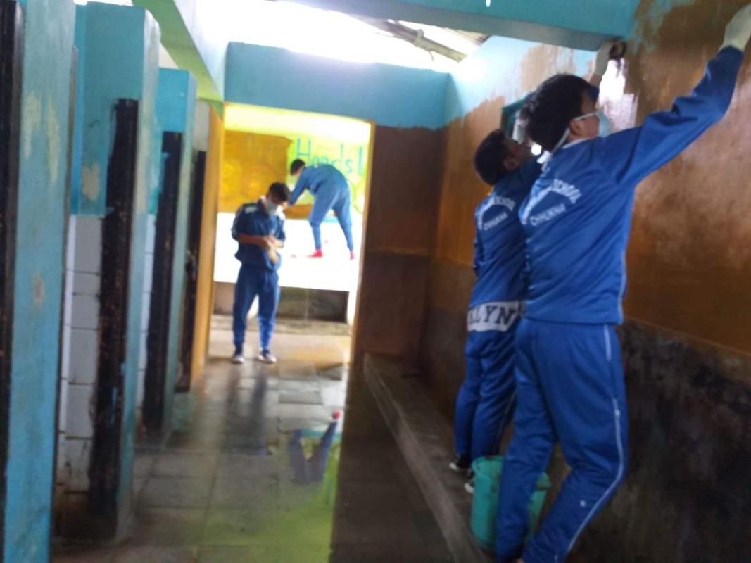 Thorough Cleaning and Painting of School toilets during Vacation