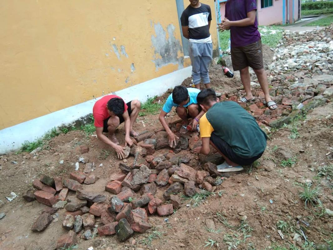 Construction of footpath from RK hostel to College infirmary 