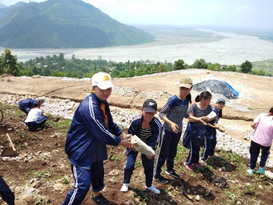 Helping hand towards construction of chorten(Stupa)