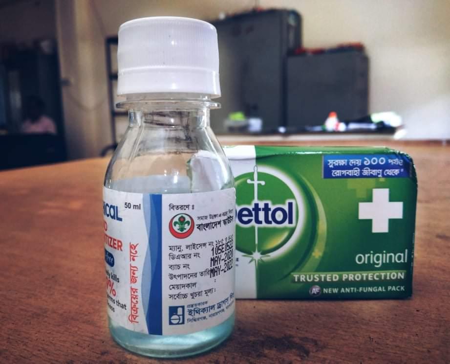 Distributing Dettol Soap & Alcohol Based Hand-sanitizer to the Scouts.