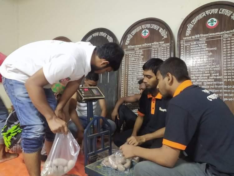 Packing relief materials for flood affected people.