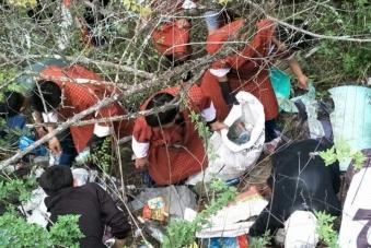 paper picking beside town