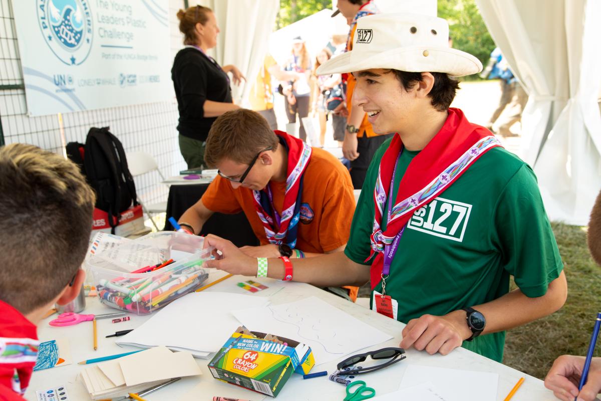 Scouts doing a written activity