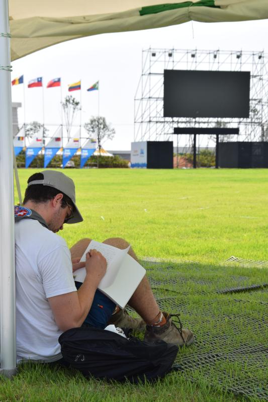A young scout journaling 