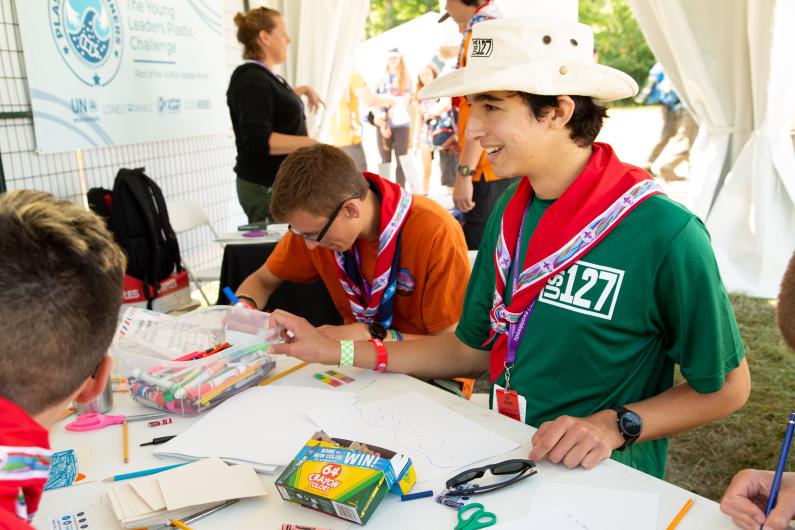 Scouts doing a written activity