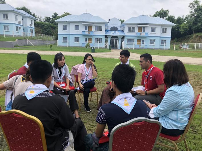 Young scouts during a discussion session 