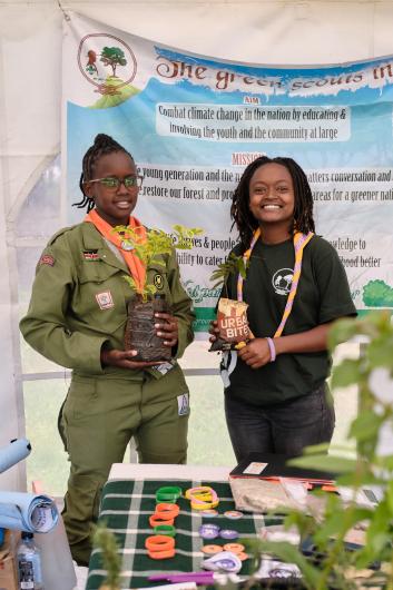 Young scouts planting seedlings 